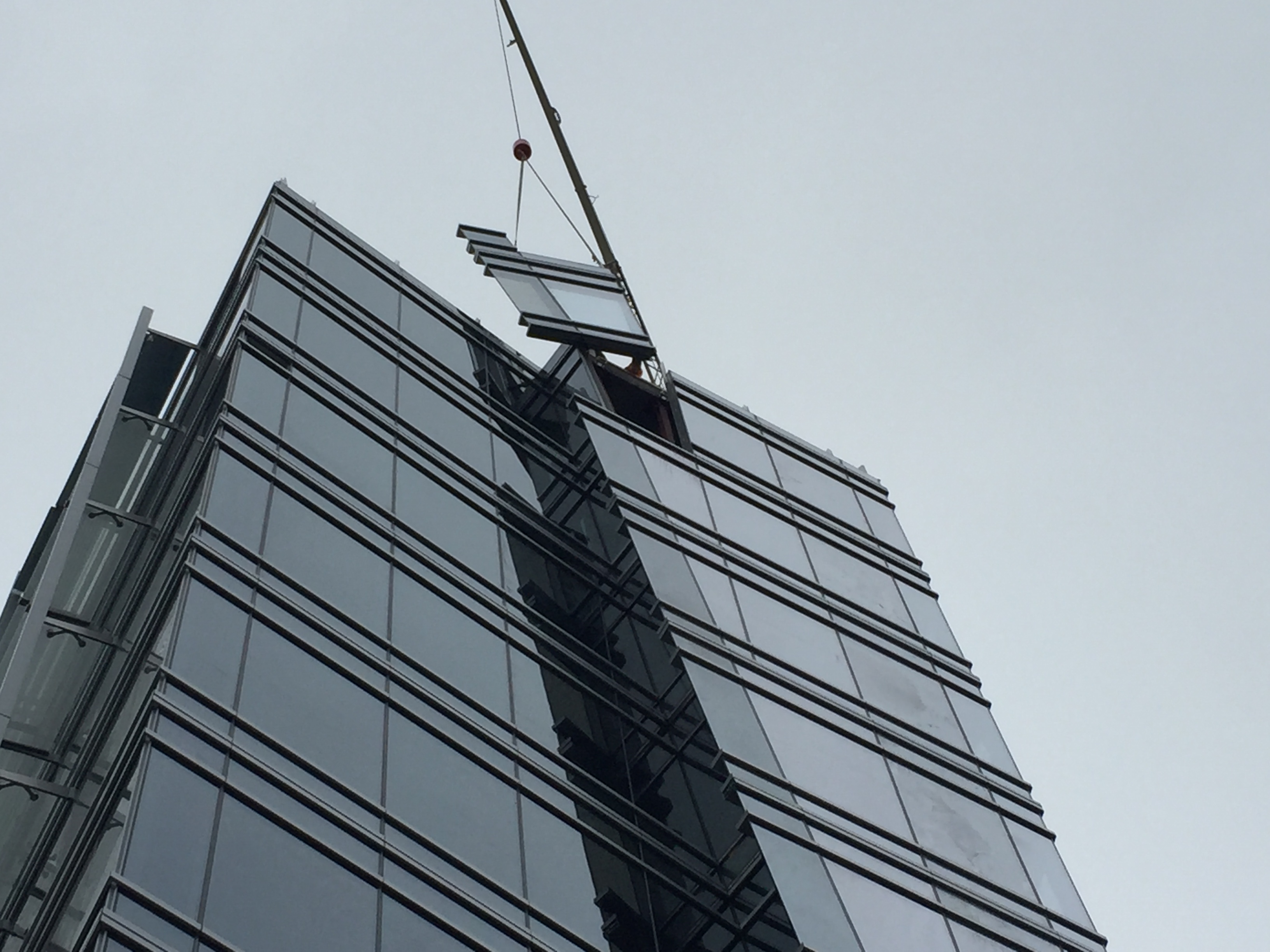 800 North Glebe Road curtainwall unit being craned into place